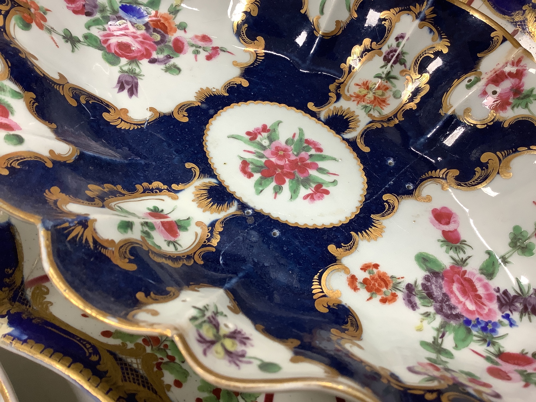 An Assortment of 18th century Worcester and Chelsea porcelain tableware and a Derby figure, damaged